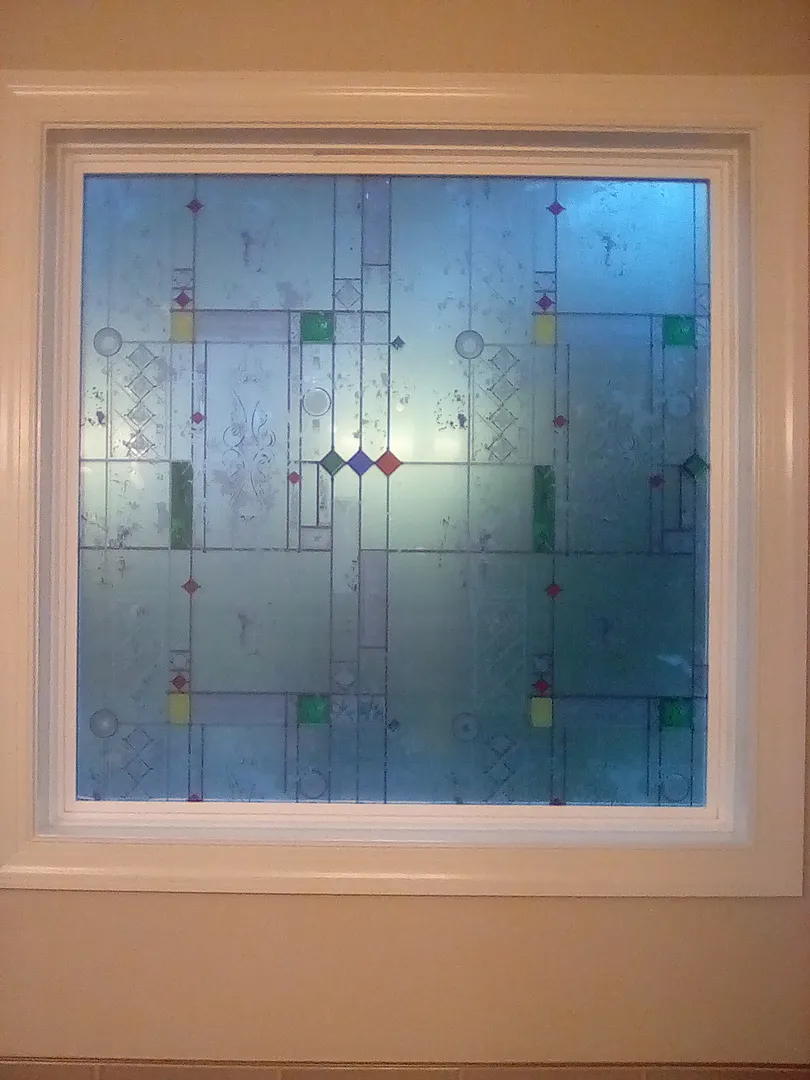 Bathroom window with SXEG-4888 French Quarter blue geometric stained glass film